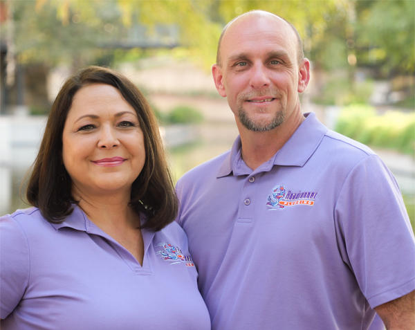 chris and kathy copeland standing beside each other