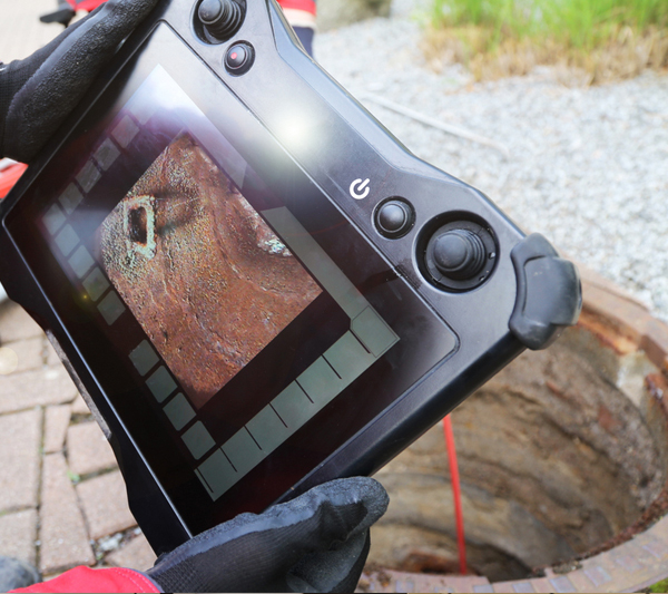 Video scope inspecting a sewer system